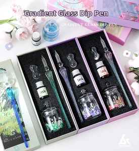 Detailed set of gradient glass dip pens with ink bottles and glass jars in floral gift boxes