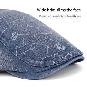 Vintage light blue denim newsboy hat with quilted stitching and a wide brim design