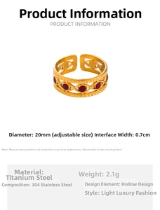 Detail view of gold stainless steel open ring with woven texture and red round enamel inlay