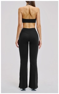 Detail of high-waist flared yoga pants with V-shaped stitching for a butt-lifting effect