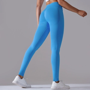 Detailed back view of high-waisted seamless blue yoga leggings showing push-up lifting effect