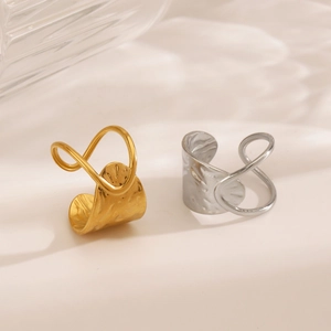 Minimalist geometric hammered stainless steel rings in gold and silver finishes