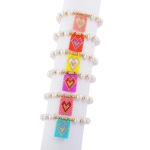 Bohemian freshwater pearl bracelets set with colorful woven heart pendants and gold beads