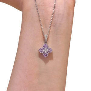 Sparkling zircon flower pendant necklace with purple heart-shaped petals on silver chain