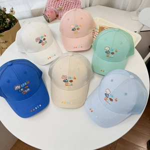 Detail of breathable mesh kids' baseball caps with 'My little cutie' embroidery