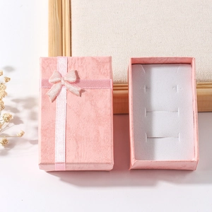 Pink marble jewelry gift box with ribbon bow, showing open and closed views