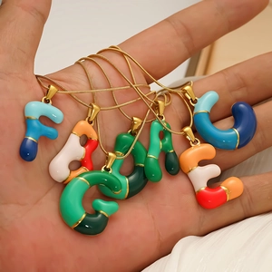 Colorful 3D bubble letter pendant necklace with vibrant enamel and gold finish chain