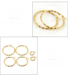 Detail of 18K gold plated stainless steel hoop earrings with ripple textured design