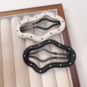 Polka dot PU leather hair clips in wavy cloud shape, cream and black hairpins