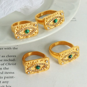 Gold evil eye rectangular ring with green malachite stone and sparkling white zircons