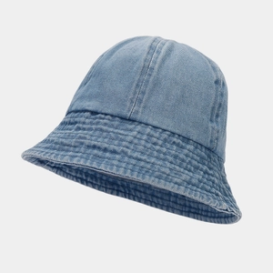 Detailed view of washed light blue denim bucket hat with decorative topstitching