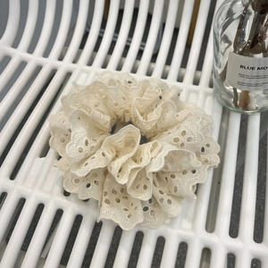 Lace ruffle scrunchie in off-white with delicate hollow embroidery floral pattern