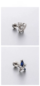 Detailed close-up of blue zircon star butterfly ear studs with secure screw-in backings