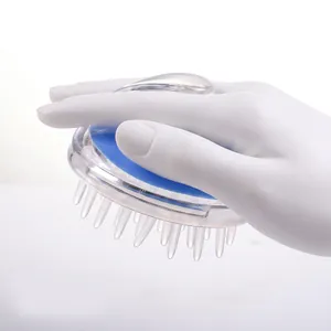 Blue silicone scalp massager brush with ergonomic transparent handle for hair washing