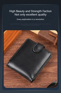 Close-up of a men's vintage black PU leather wallet with neat stitching and buckle