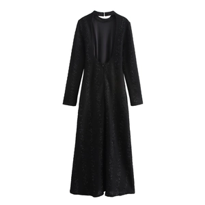 Elegant black backless long sleeve maxi dress with shimmering texture flat lay display