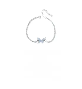 Macro shot of S925 silver double-layer bracelet with blue enamel butterfly pendant
