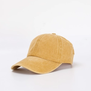 Adjustable mustard yellow washed cotton baseball cap in classic vintage dad hat style