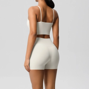 Close-up of cream yoga set showing thin straps and high waist back compression