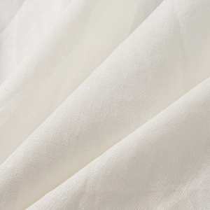 Elegant white V-neck batwing sleeve blouse showing premium textured woven fabric