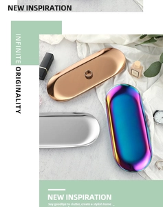 Polished stainless steel oval jewelry trays in rose gold, silver and iridescent finishes