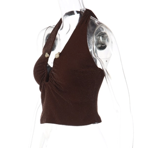 Detail of brown shimmer knit halter top featuring a deep V-neck and decorative beads