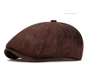 Close-up of retro coffee newsboy cap in distressed faux suede with vintage texture