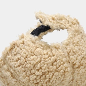 Adjustable back strap of a minimalist sherpa fleece baseball cap in beige khaki color
