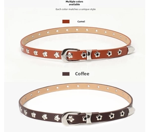 Detail view of camel and coffee leather belts with flower eyelets and silver buckles