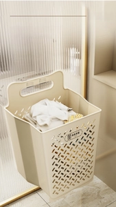 Wall-mounted foldable laundry basket with breathable mesh and sturdy handle for clothes