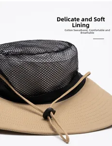 Detail of khaki sun hat featuring breathable black mesh crown and adjustable wind cord