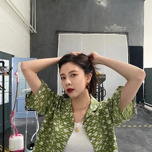 Short sleeve green floral print shirt with layered gold zircon initial necklaces