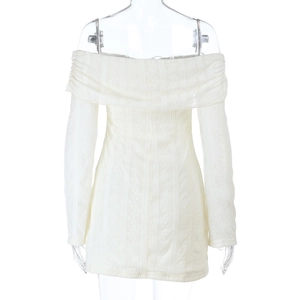 Close-up of the intricate white lace floral texture on the off-shoulder mini dress