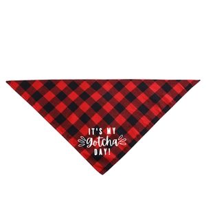 Close-up of red and black buffalo plaid pet bandana with white IT'S MY Gotcha DAY text