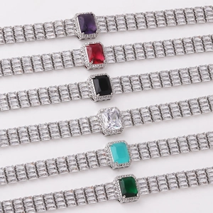 Close-up of rectangular gemstone bracelets with triple-row diamonds in six colors