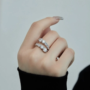 Luxurious S925 sterling silver open rings with symmetric zircon inlay worn by model