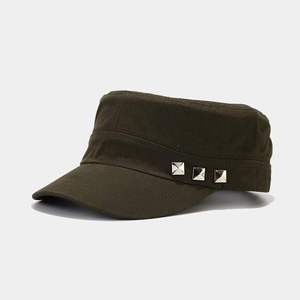 Detailed macro view of olive green cotton military cap featuring silver square rivets