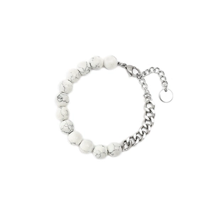 Detail of white turquoise beads and silver Cuban chain bracelet with lobster clasp
