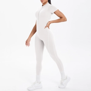 Detail of white sports jumpsuit featuring a stand collar and front zipper closure