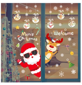 Detail of Santa Claus and reindeer window stickers with Merry Christmas greeting text