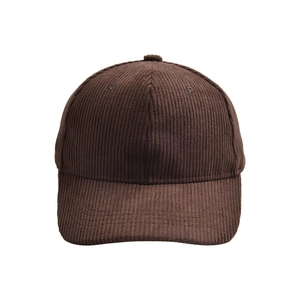Close-up of the vintage dark brown corduroy texture on a solid color baseball cap