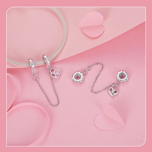Detail of S925 sterling silver safety chain with pink crystal heart charms for bracelets