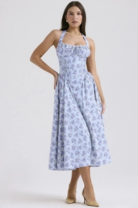 Close-up of light blue floral print and corset waist detail on the summer midi dress