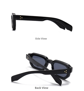 Detail of trendy black sunglasses featuring golden star rivets and polished side frame