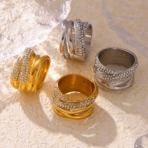 Cross woven multi-row pavé diamond ring in 18k gold and silver plated titanium steel