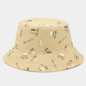 Detail of yellow cotton bucket hat featuring all-over durian print and handwritten typography
