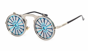 Detail shot of silver metal steampunk sunglasses with blue gear-patterned flip-up lenses