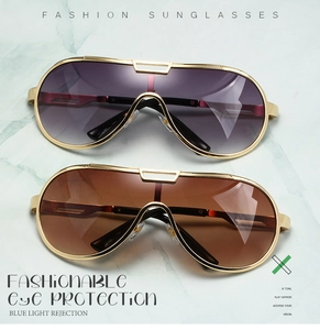 Detail of oversized retro aviator sunglasses with purple and brown gradient lenses