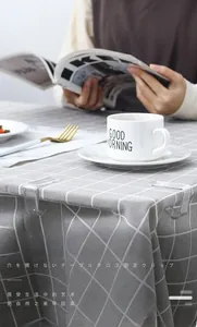 Close-up of transparent U-shaped tablecloth clip with no-puncture elastic design