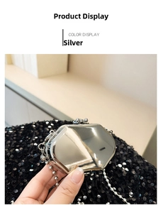 Close-up of a mini silver octagonal metal bag with mirror finish and ball chain